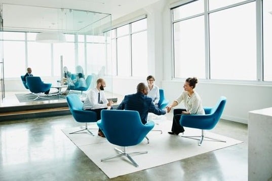 Business woman shaking hands