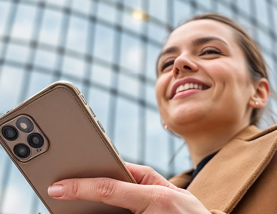 Lady-smiling-on-mobile-header