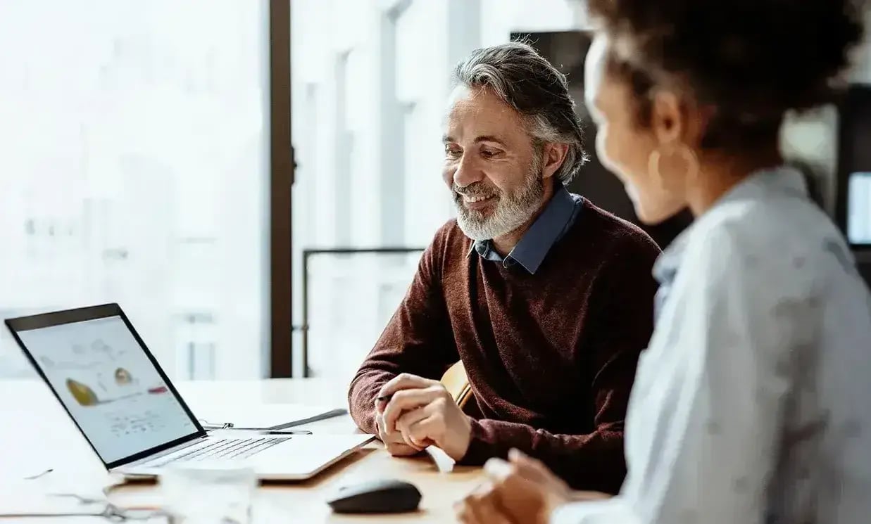 Colleagues-collaborating-office-Header-1